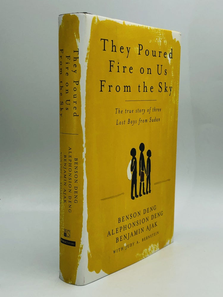 Item #70479 THEY POURED FIRE ON US FROM THE SKY: The True Story of Three Lost Boys from Sudan. Benson Deng, Alephonsion Deng, Benjamin Ajak, Judy A. Bernstein.