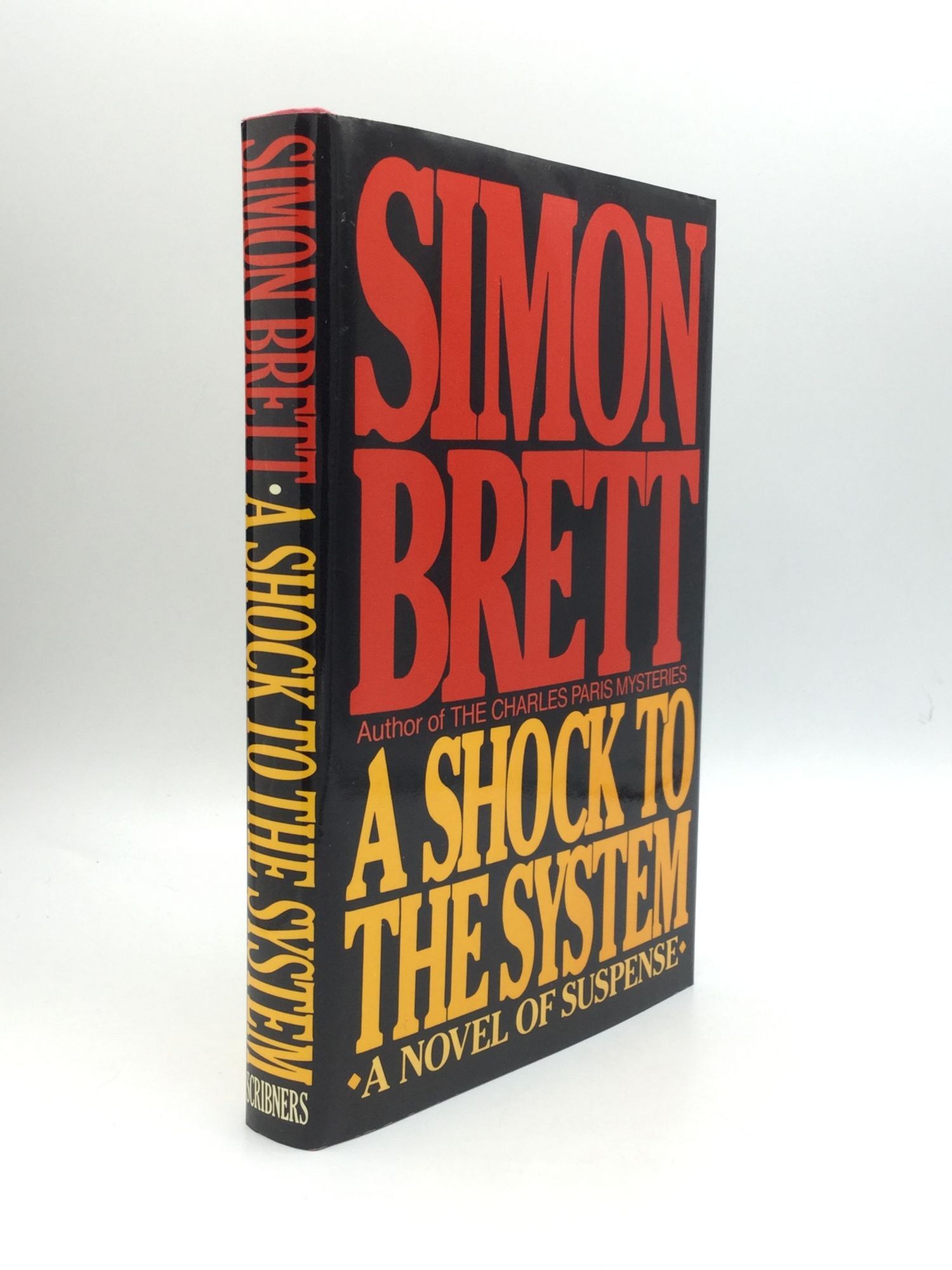 A SHOCK TO THE SYSTEM Simon Brett First Edition a-shock-to-the-system-simon-brett-first-edition