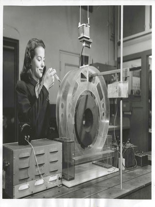 PRESS PHOTOGRAPHS SHOWING WOMEN AT WORK